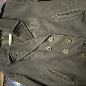 A woman’s overcoat enlisted pea coat.